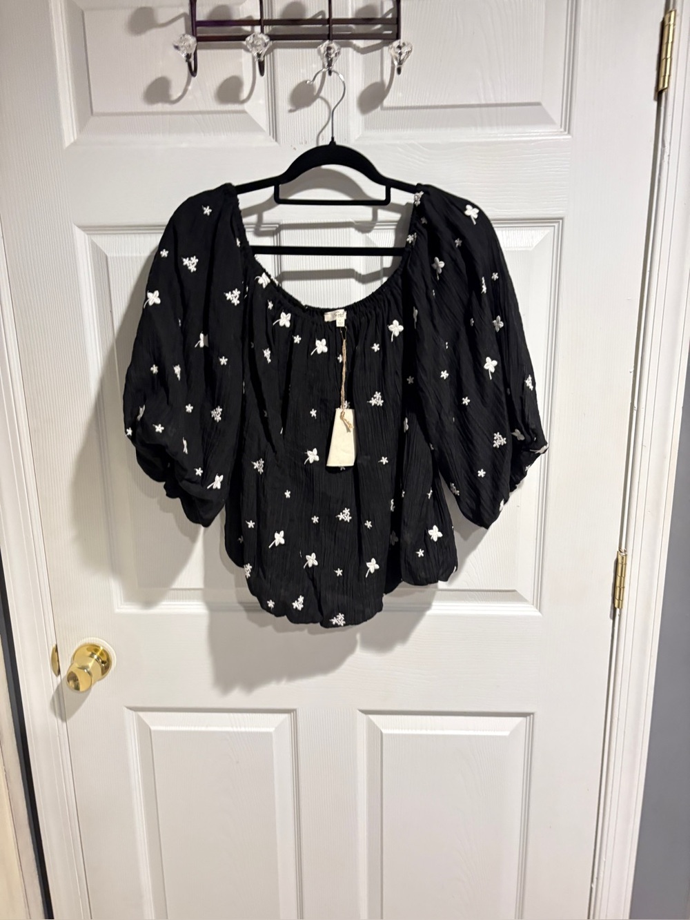 Easel Women’s Black Puff Sleeve Peasant Top with White Floral Embroidery